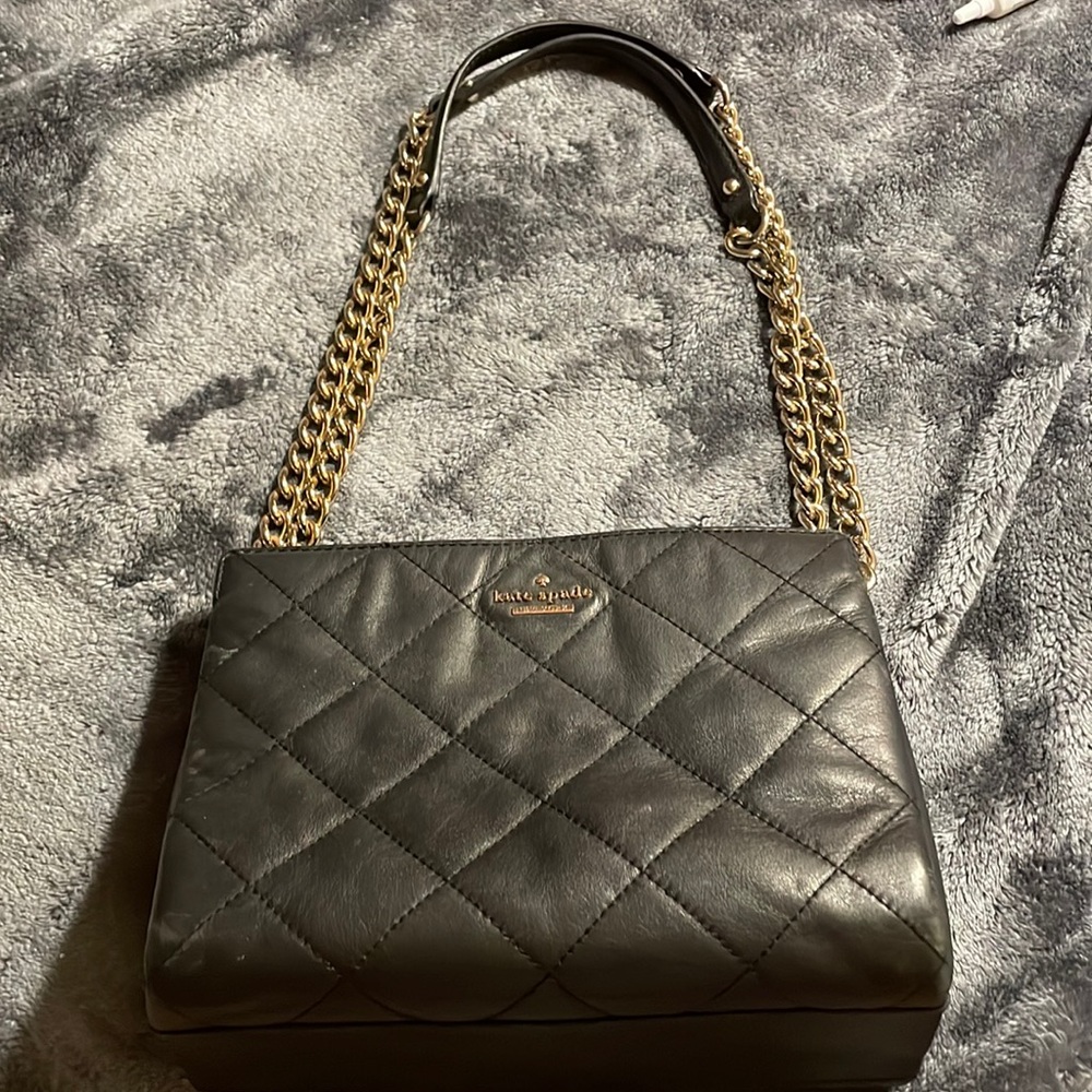 This is a black Kate spade purse.